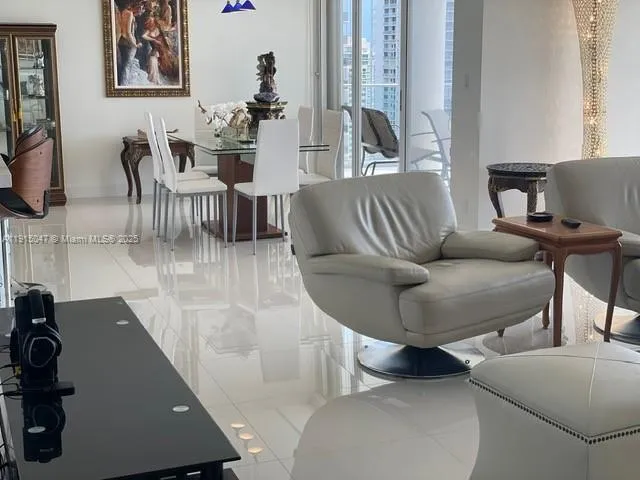 a kitchen with a sink and a microwave