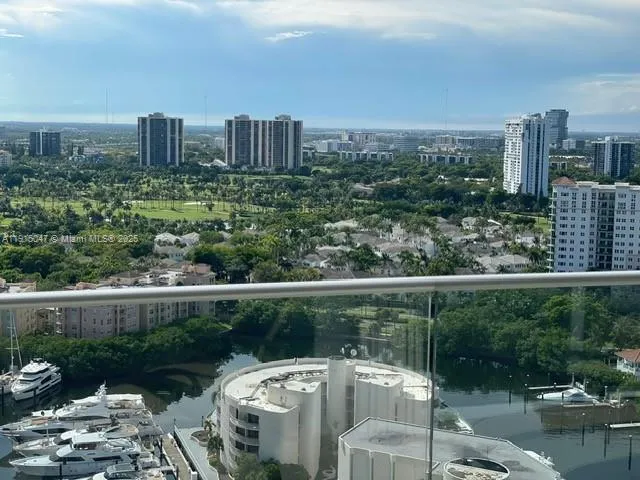 a view of a city skyline from a balcony