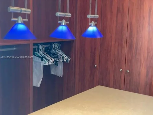 a view of a vase of flowers sitting on a table