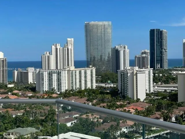 a view of a lake with a city