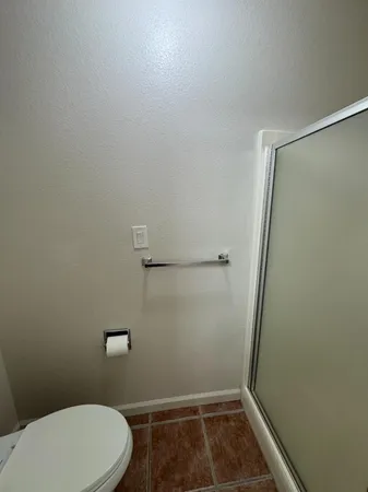 a bathroom with a toilet