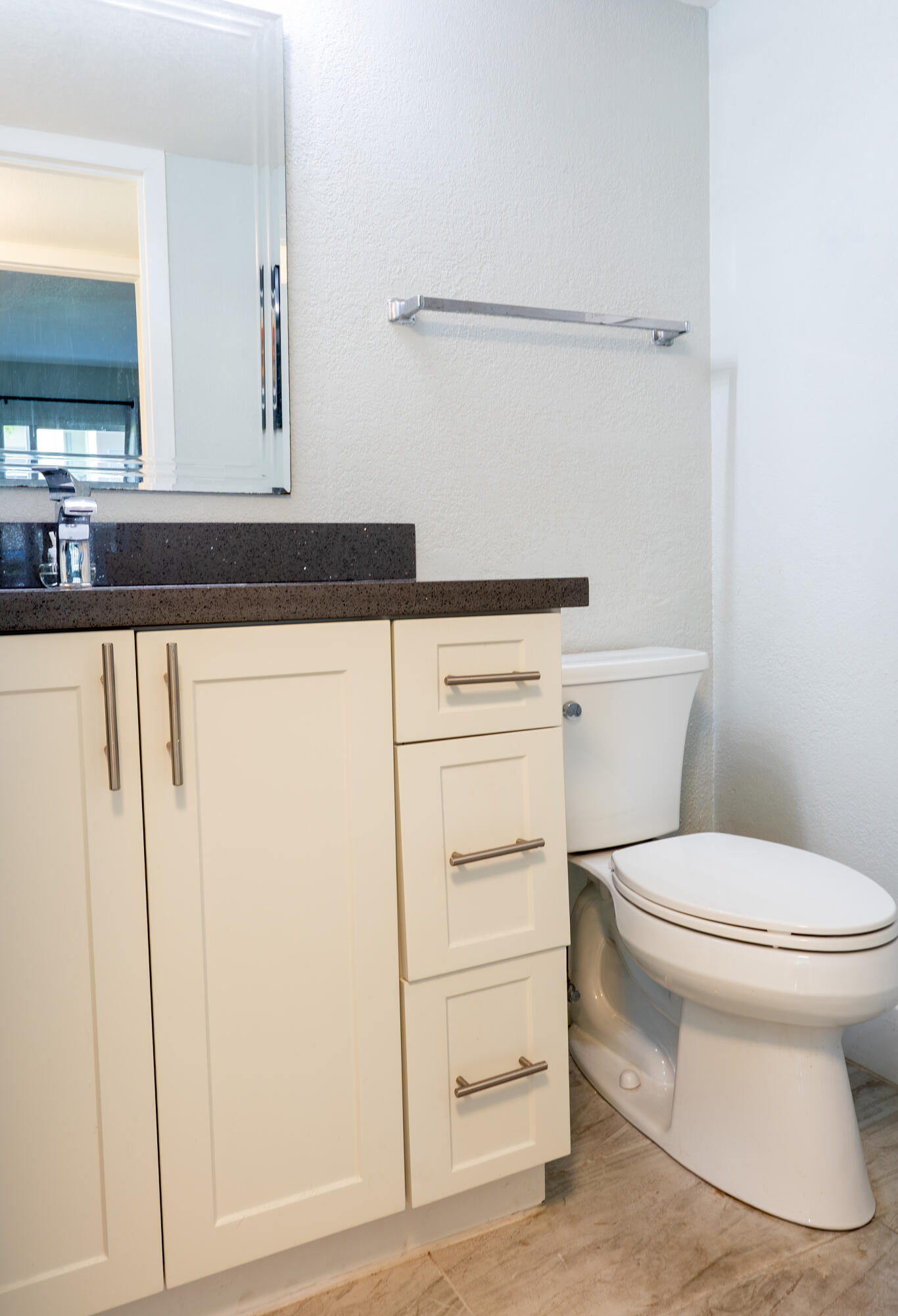 592 Fanshaw O Boca Raton, FL 33434 - Photo 13 of 26 a bathroom with a toilet and a sink