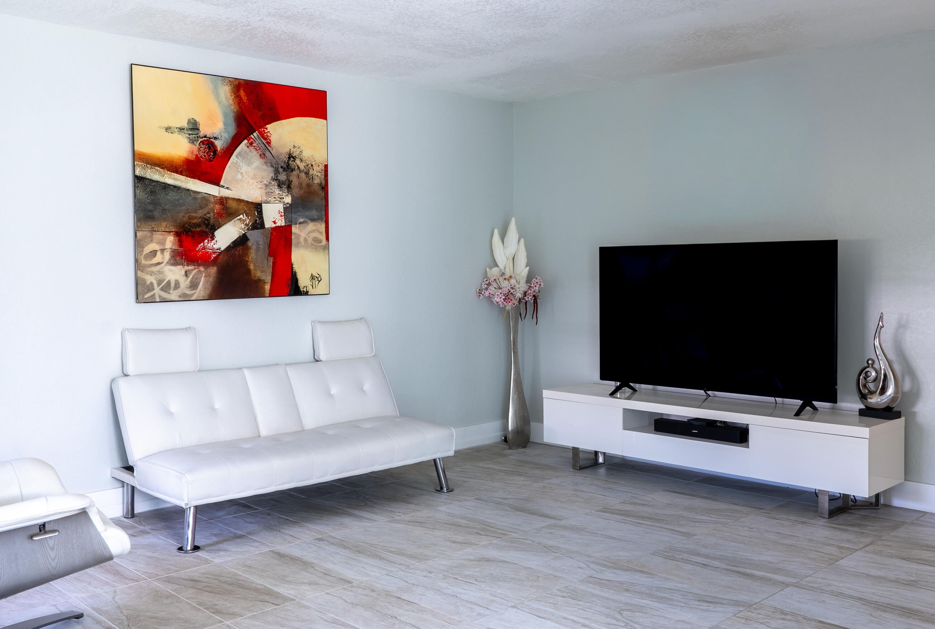 592 Fanshaw O Boca Raton, FL 33434 - Photo 2 of 26 a living room with furniture and a flat screen tv