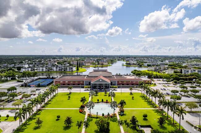 592 Fanshaw O Boca Raton, FL 33434 - Photo 21 of 26 a view of a swimming pool and lake view