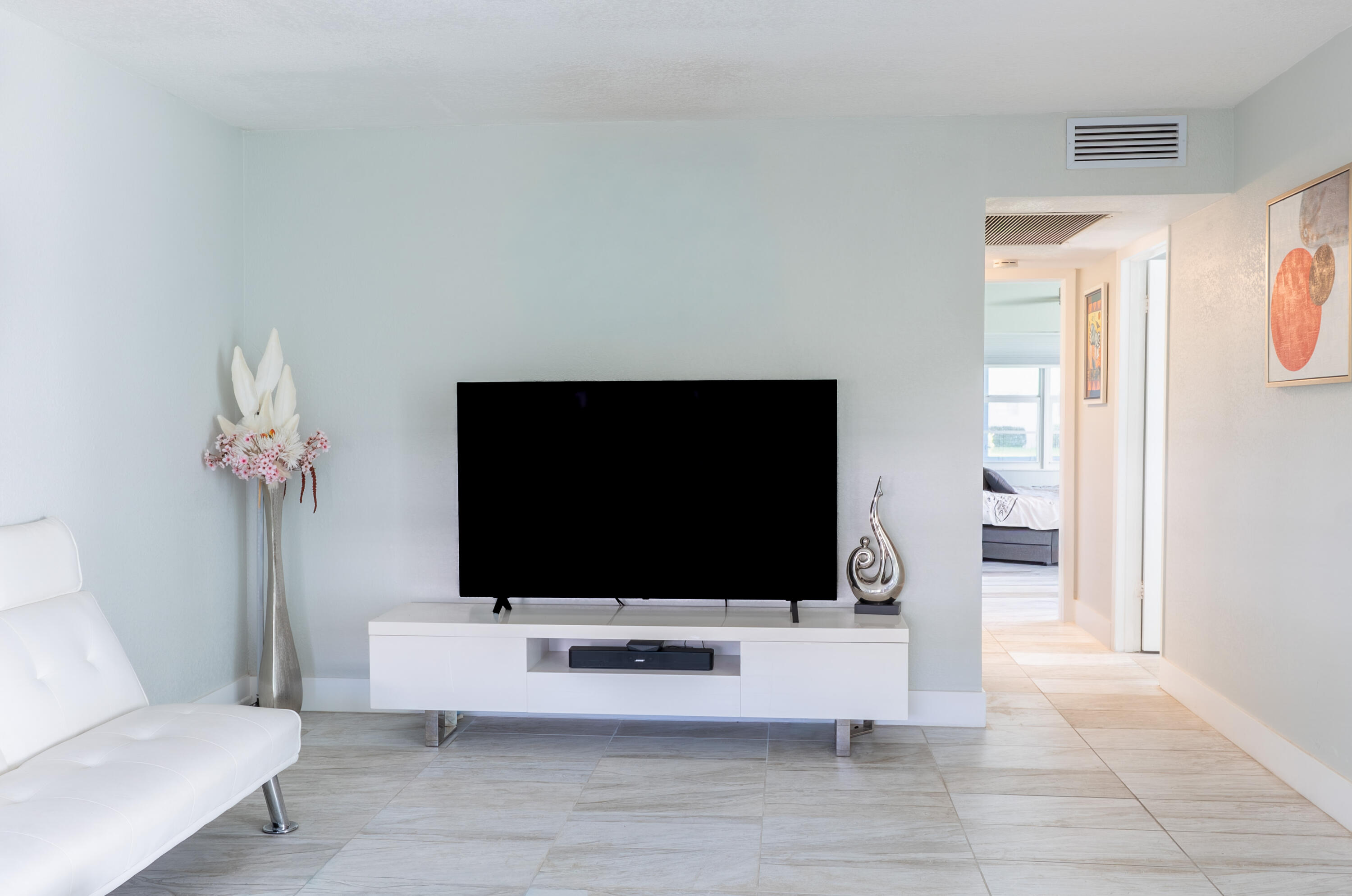 592 Fanshaw O Boca Raton, FL 33434 - Photo 10 of 26 a living room with furniture and a flat screen tv