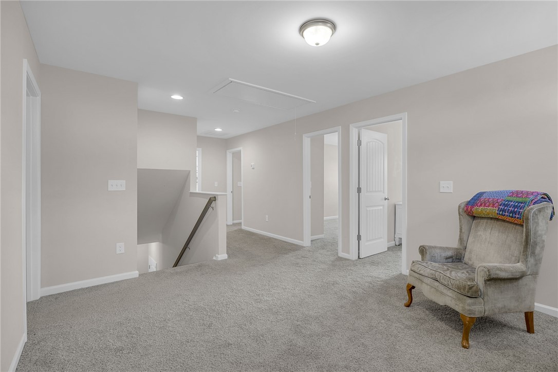 430 Johnson Road Central, SC 29630 - Photo 10 of 36 A spacious secondary living area features soft carpeting and ample room for relaxation.