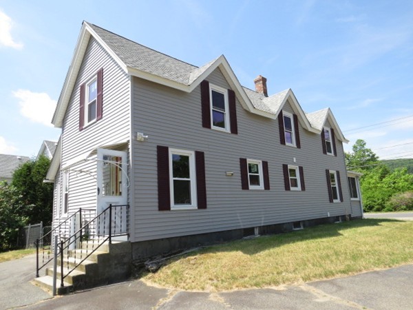 37 Bethany Road Monson, MA 01057 - Photo 2 of 15 a front view of a house with a yard
