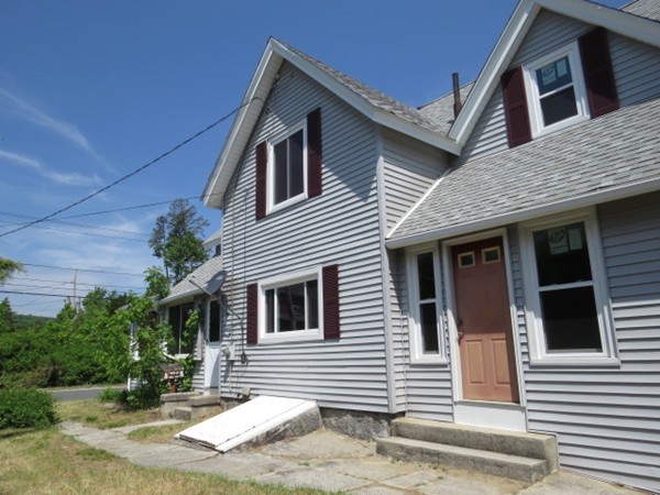 37 Bethany Road Monson, MA 01057 - Photo 3 of 15 a view of a house with a yard and potted plants