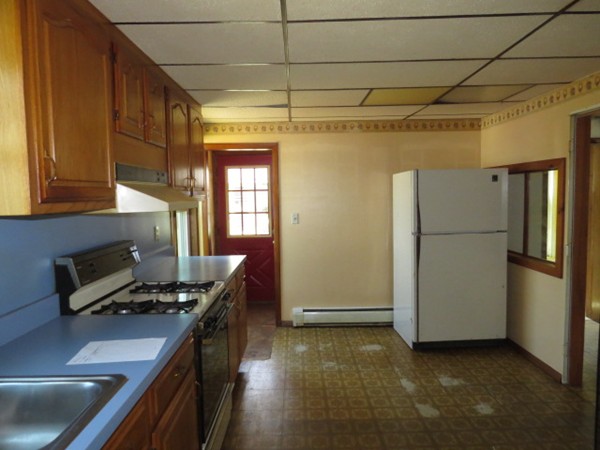 37 Bethany Road Monson, MA 01057 - Photo 4 of 15 a kitchen with stainless steel appliances granite countertop a refrigerator and a stove