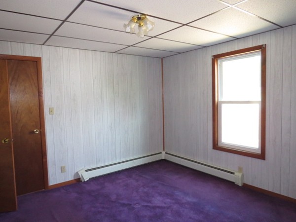 37 Bethany Road Monson, MA 01057 - Photo 8 of 15 a view of a room with window and chandelier fan