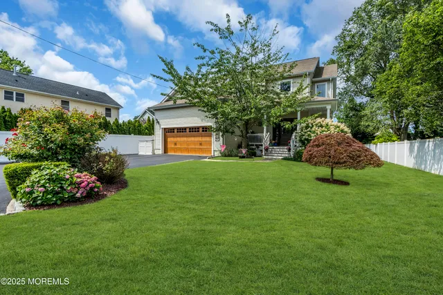 a front view of a house with a outdoor space