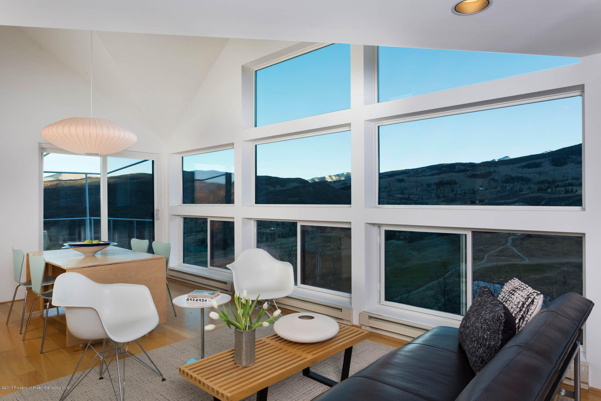 61 Oak Ridge Road Snowmass Village, CO 81615 - Photo 11 of 35 a living room with furniture and a large window