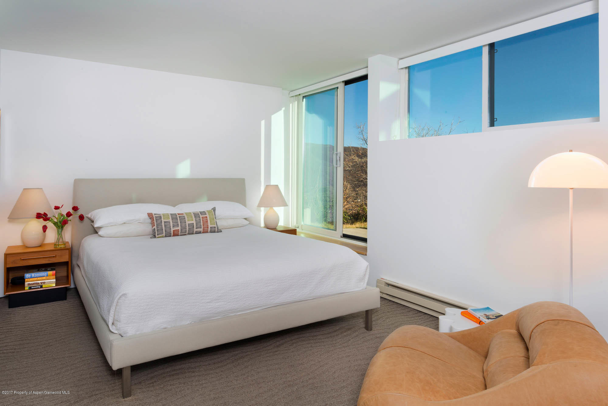 61 Oak Ridge Road Snowmass Village, CO 81615 - Photo 18 of 35 a bedroom with a bed couch and a window