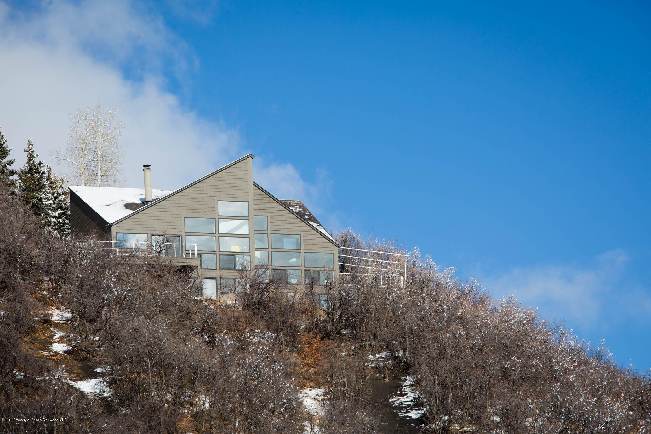 61 Oak Ridge Road Snowmass Village, CO 81615 - Photo 2 of 35 a view of a house with a dry yard