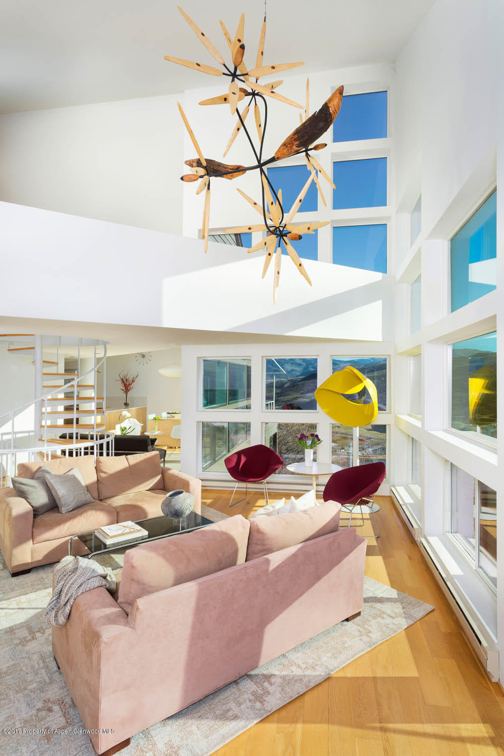 61 Oak Ridge Road Snowmass Village, CO 81615 - Photo 3 of 35 a living room with furniture and a flat screen tv