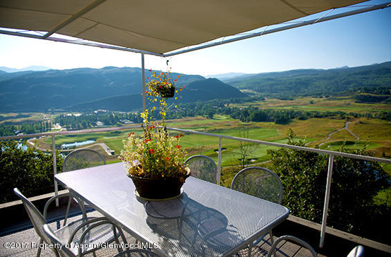 61 Oak Ridge Road Snowmass Village, CO 81615 - Photo 31 of 35 a view of a chairs and table in patio