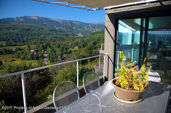 61 Oak Ridge Road Snowmass Village, CO 81615 - Photo 32 of 35 a view of a porch with furniture