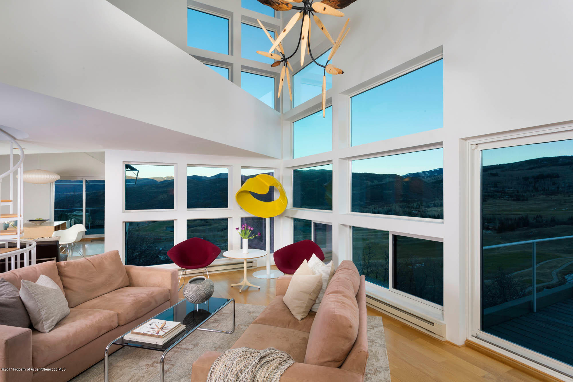 61 Oak Ridge Road Snowmass Village, CO 81615 - Photo 5 of 35 a living room with furniture ceiling fan and rug