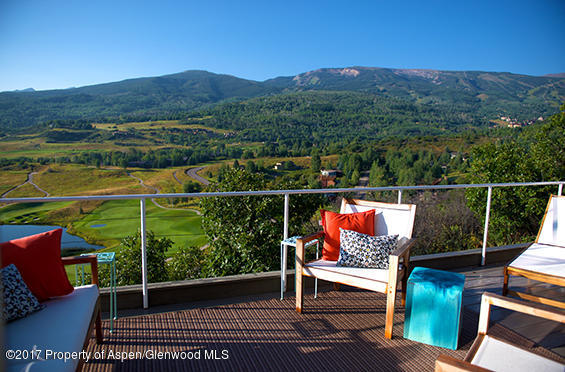 61 Oak Ridge Road Snowmass Village, CO 81615 - Photo 6 of 35 a view of a chairs in a balcony