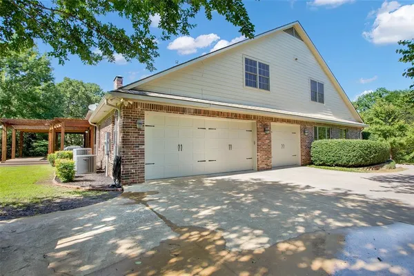 $999,900 | 48 Summit Oaks Circle, Denison, TX 75020