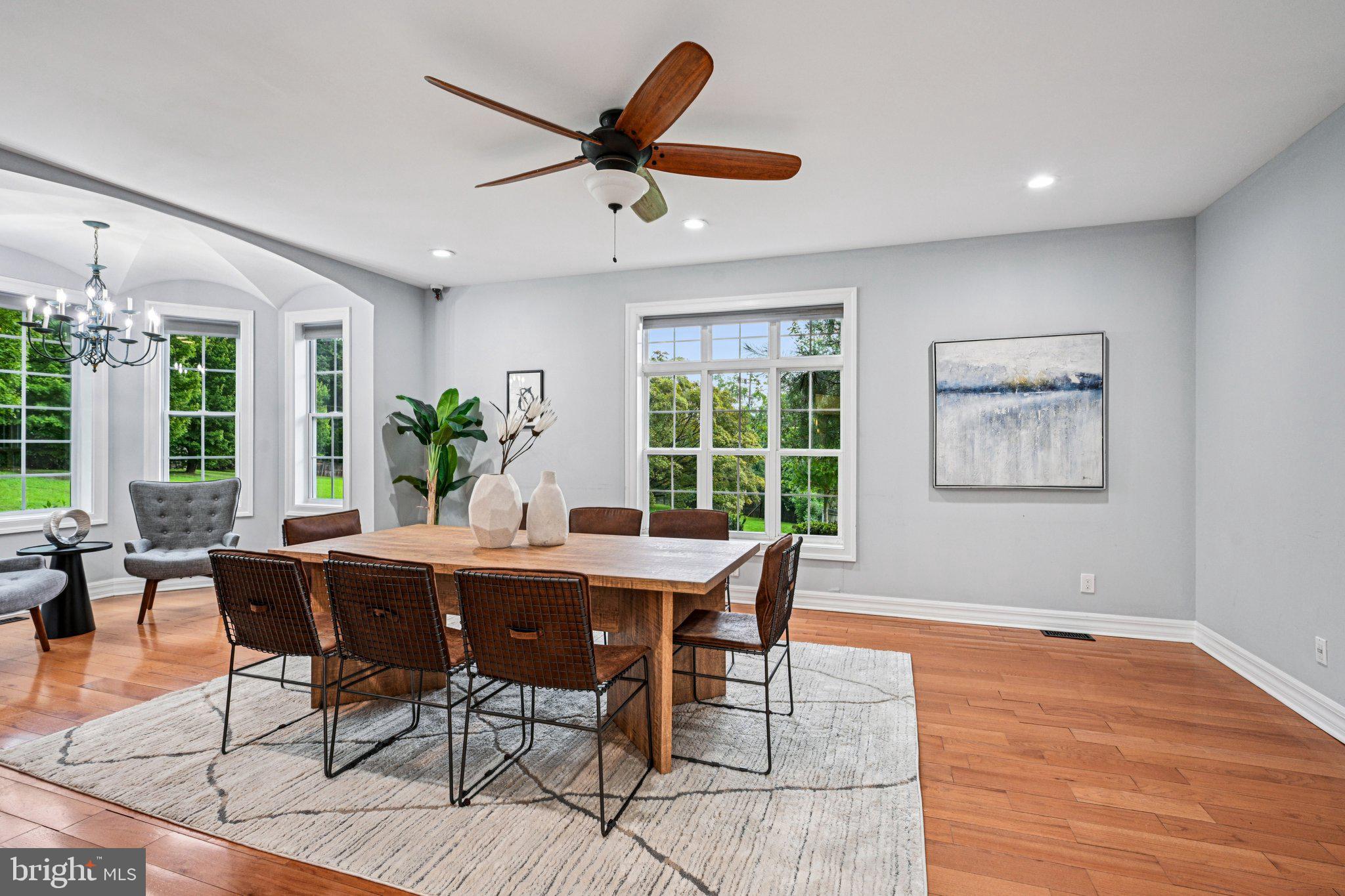 700 South Roberts Road Bryn Mawr, PA 19010 - Photo 11 of 42 a dining room with furniture a window and wooden floor