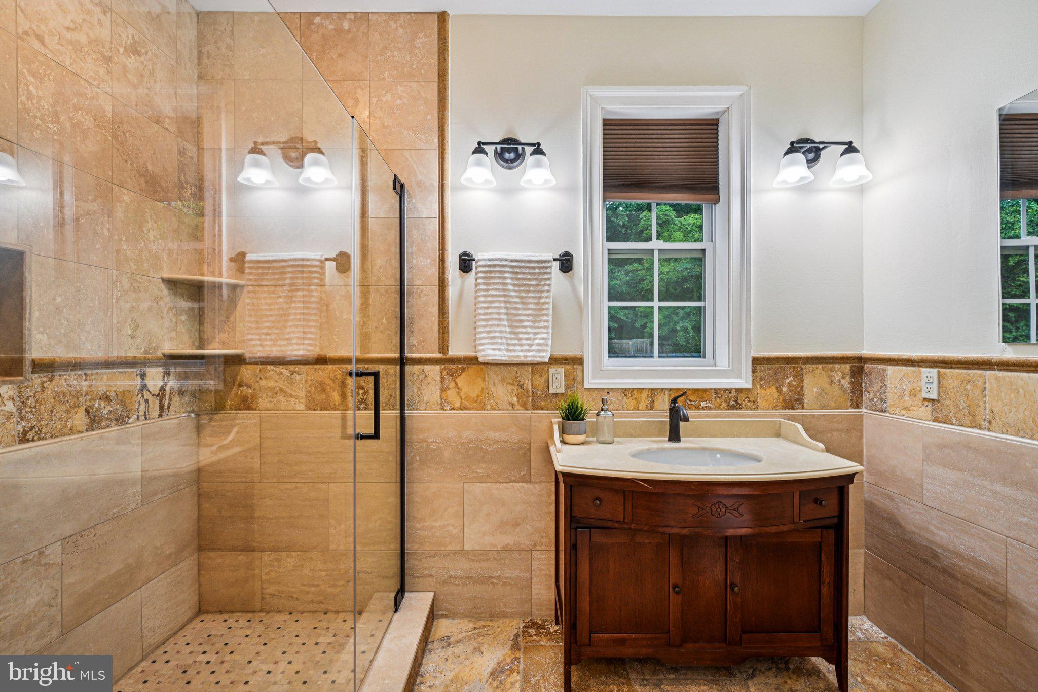 700 South Roberts Road Bryn Mawr, PA 19010 - Photo 17 of 42 a bathroom with a sink and a mirror