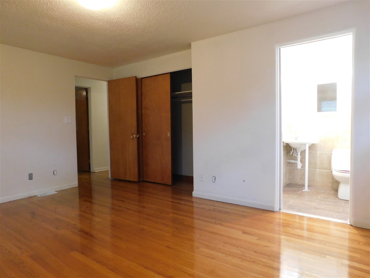 6309 Park Ridge Road Loves Park, IL 61111 - Photo 12 of 26 a view of an empty room with wooden floor