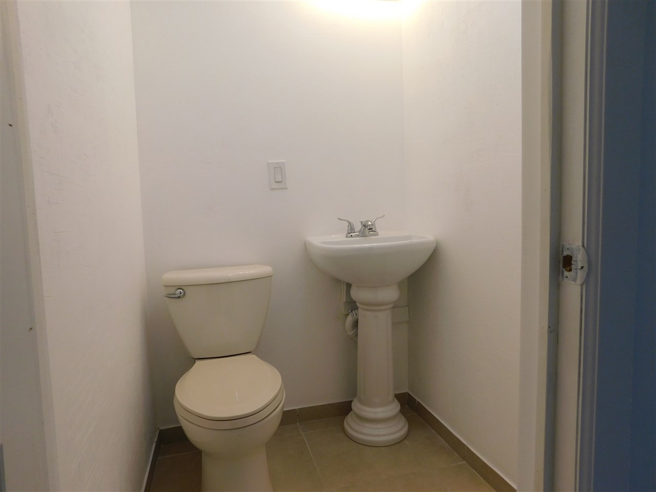 6309 Park Ridge Road Loves Park, IL 61111 - Photo 24 of 26 a bathroom with a sink and toilet