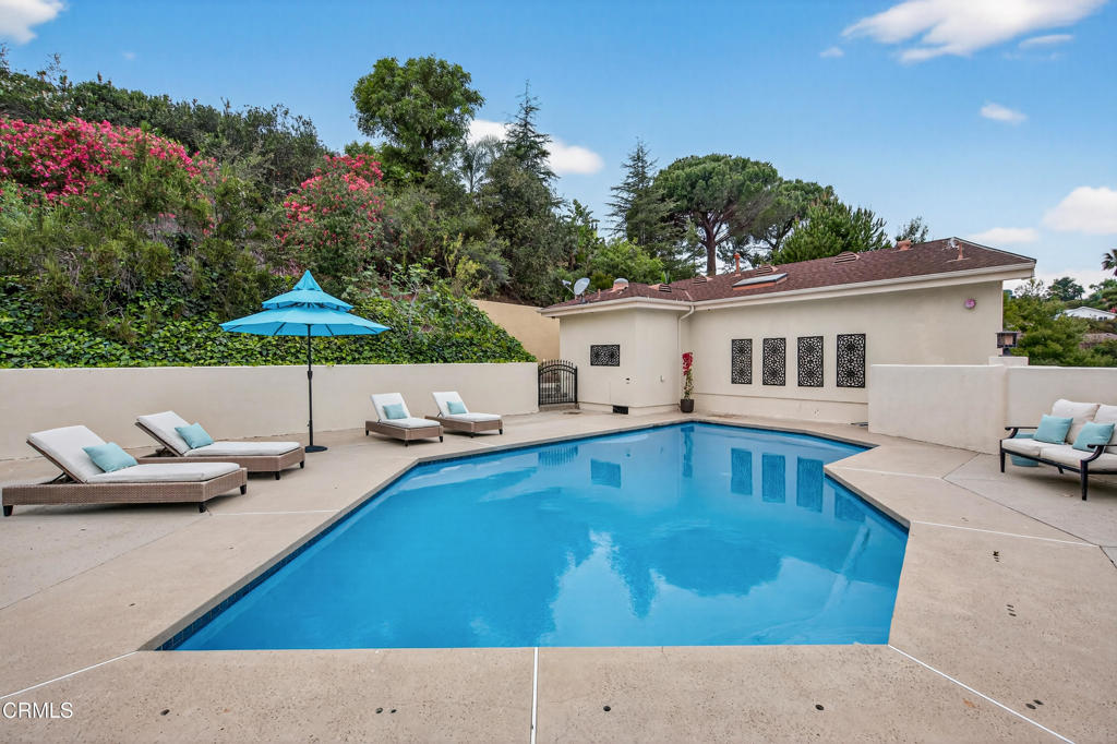 9325 La Shell Drive Tujunga, CA 91042 - Photo 28 of 46 a backyard of a house with table and chairs
