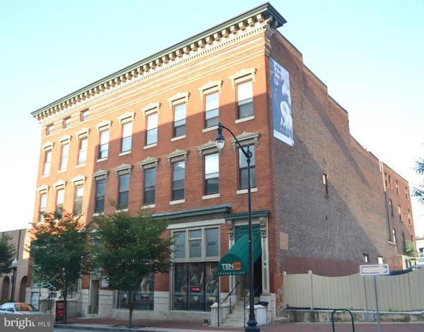 1018 North Charles Street, Unit R7 Baltimore, MD 21201 - Photo 1 of 13 a front view of a building