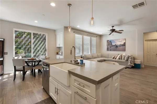 a kitchen with sink and center island