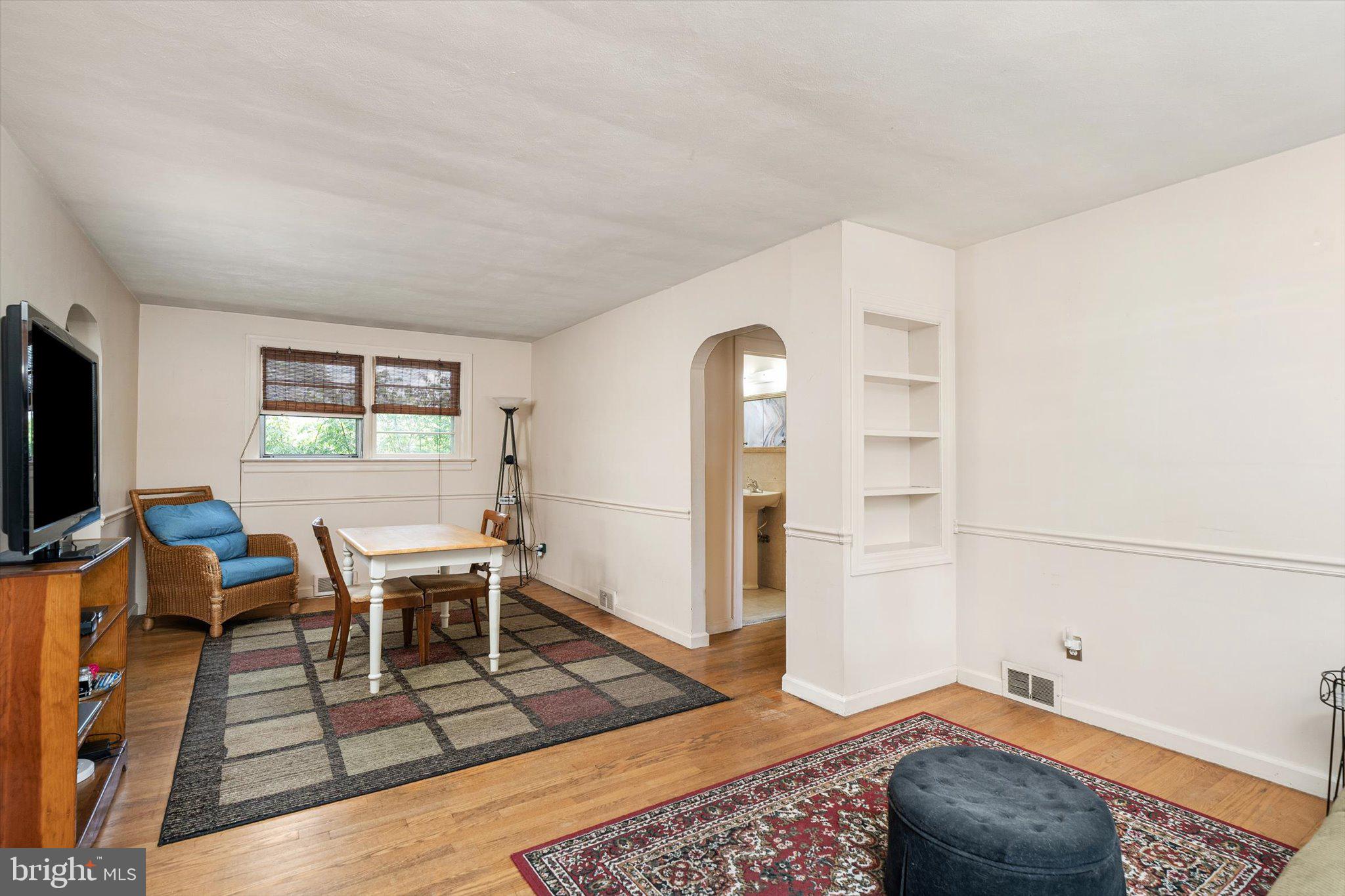 12 Fox Lane Hamilton, NJ 08620 - Photo 11 of 26 a living room with furniture and a flat screen tv