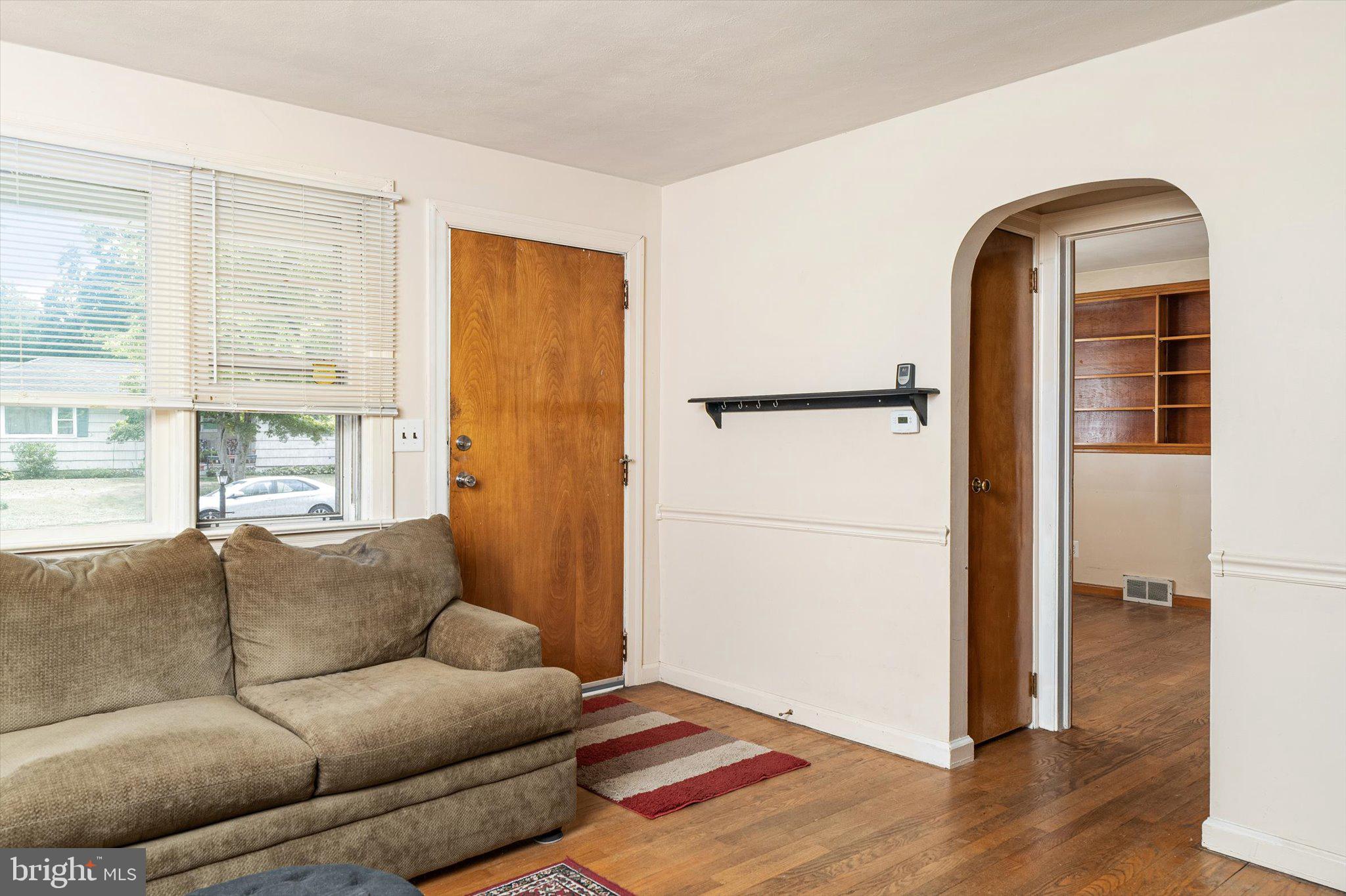 12 Fox Lane Hamilton, NJ 08620 - Photo 12 of 26 a living room with furniture and a window