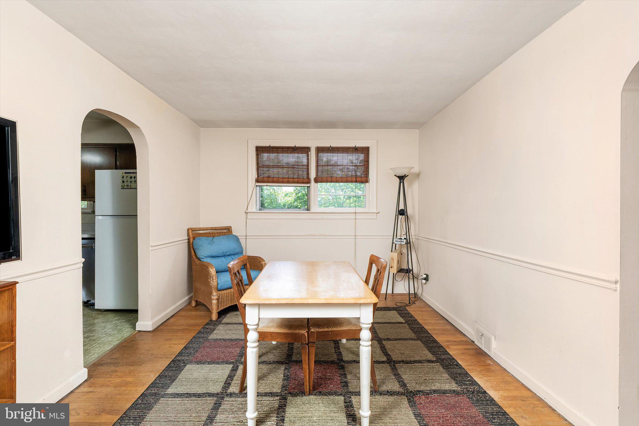 12 Fox Lane Hamilton, NJ 08620 - Photo 13 of 26 a living room with a table and chairs