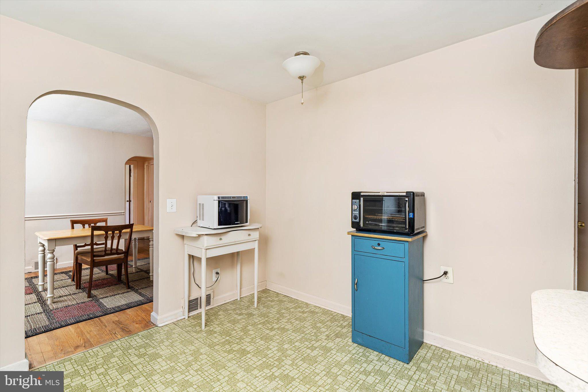 12 Fox Lane Hamilton, NJ 08620 - Photo 16 of 26 a living room with stainless steel appliances kitchen island granite countertop a stove and a refrigerator