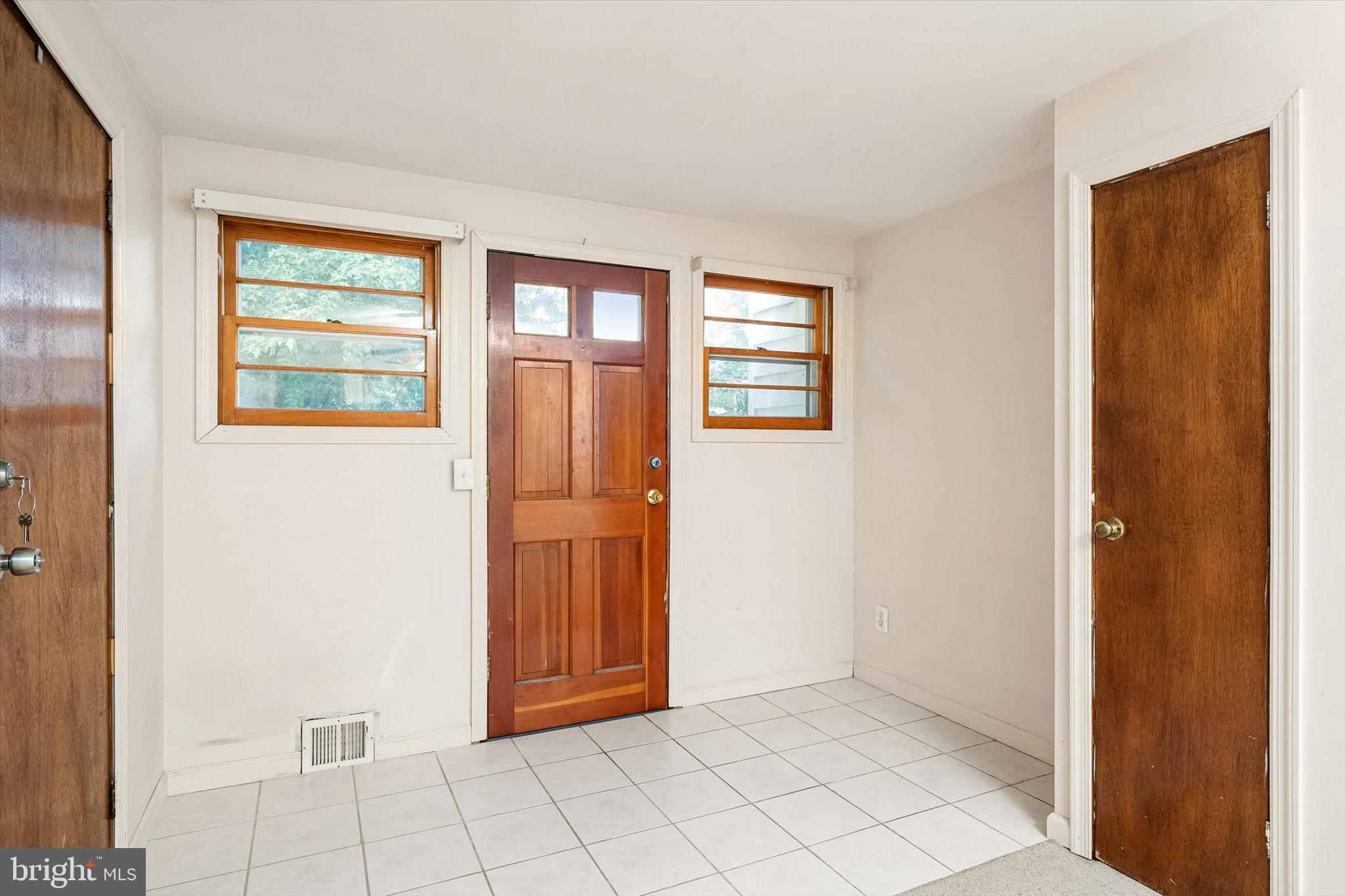 12 Fox Lane Hamilton, NJ 08620 - Photo 17 of 26 a view of an empty room with window and cabinet
