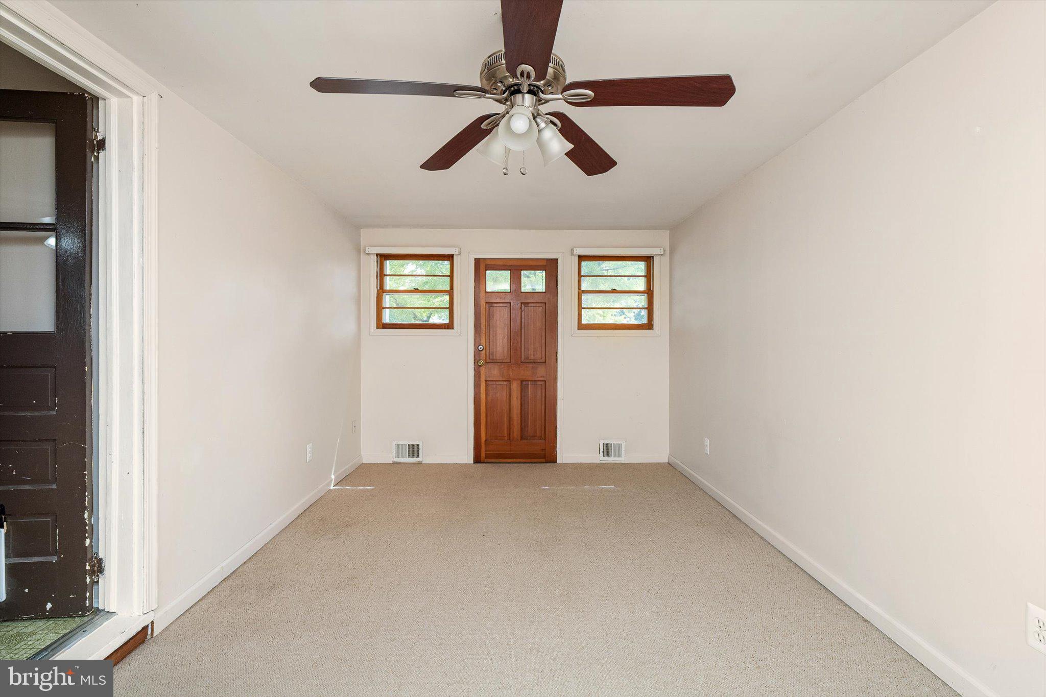 12 Fox Lane Hamilton, NJ 08620 - Photo 18 of 26 an empty room with windows and fan