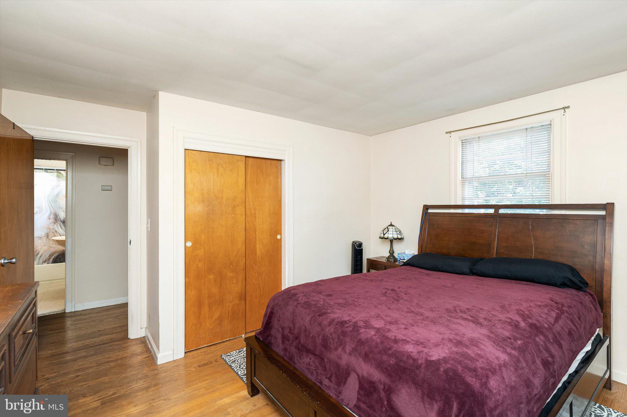 12 Fox Lane Hamilton, NJ 08620 - Photo 19 of 26 a bedroom with a bed and wooden floor