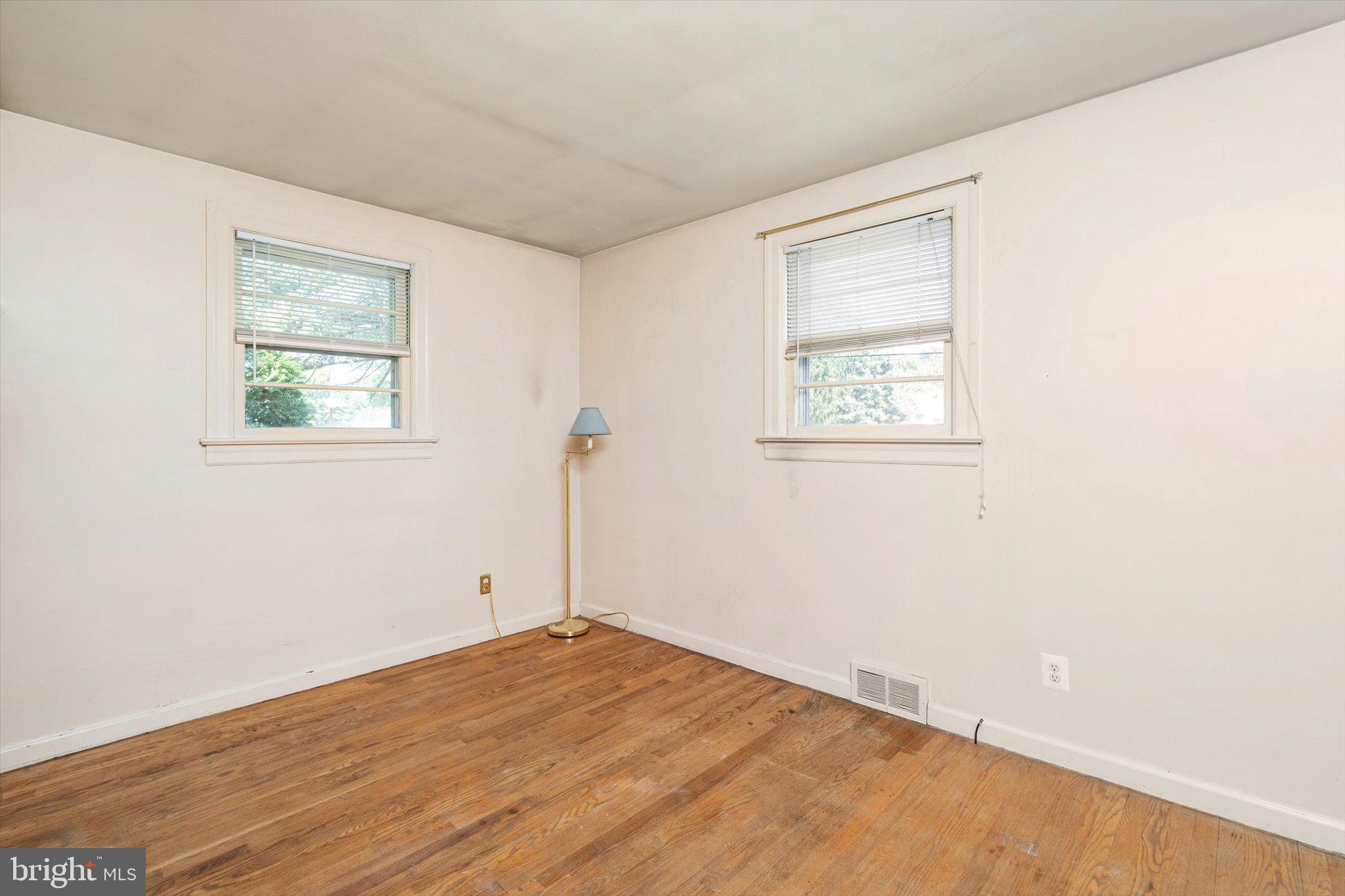 12 Fox Lane Hamilton, NJ 08620 - Photo 22 of 26 a view of empty room with wooden floor