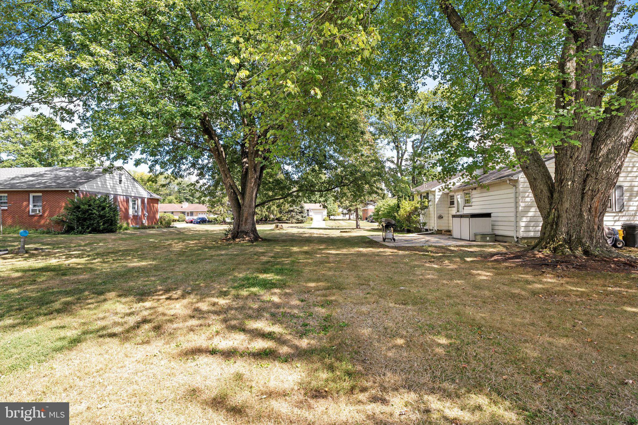 12 Fox Lane Hamilton, NJ 08620 - Photo 6 of 26 a view of backyard of house with green space