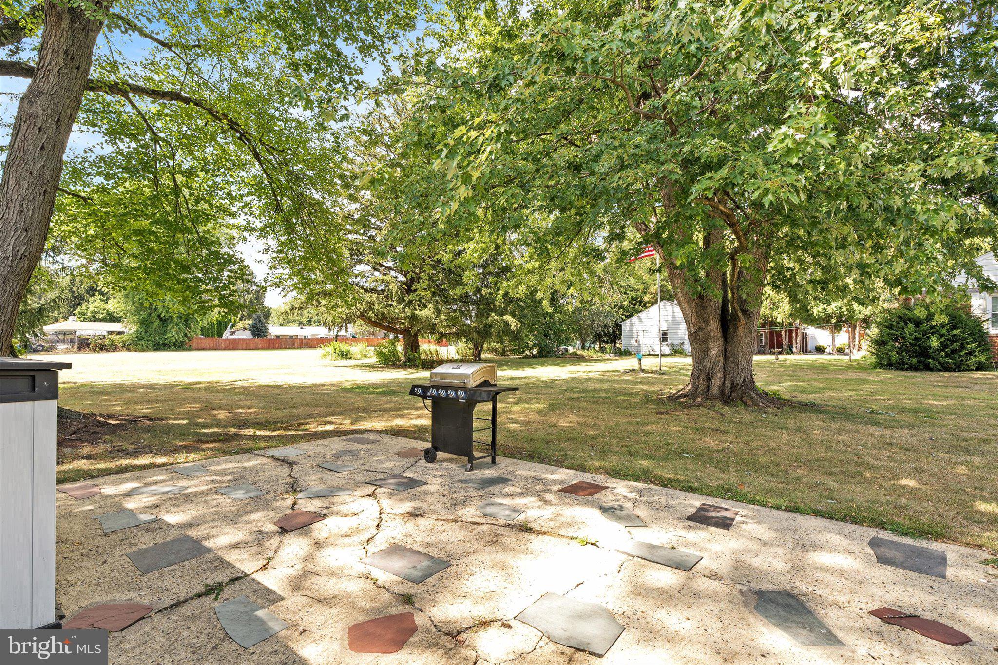 12 Fox Lane Hamilton, NJ 08620 - Photo 8 of 26 a view of yard with trees
