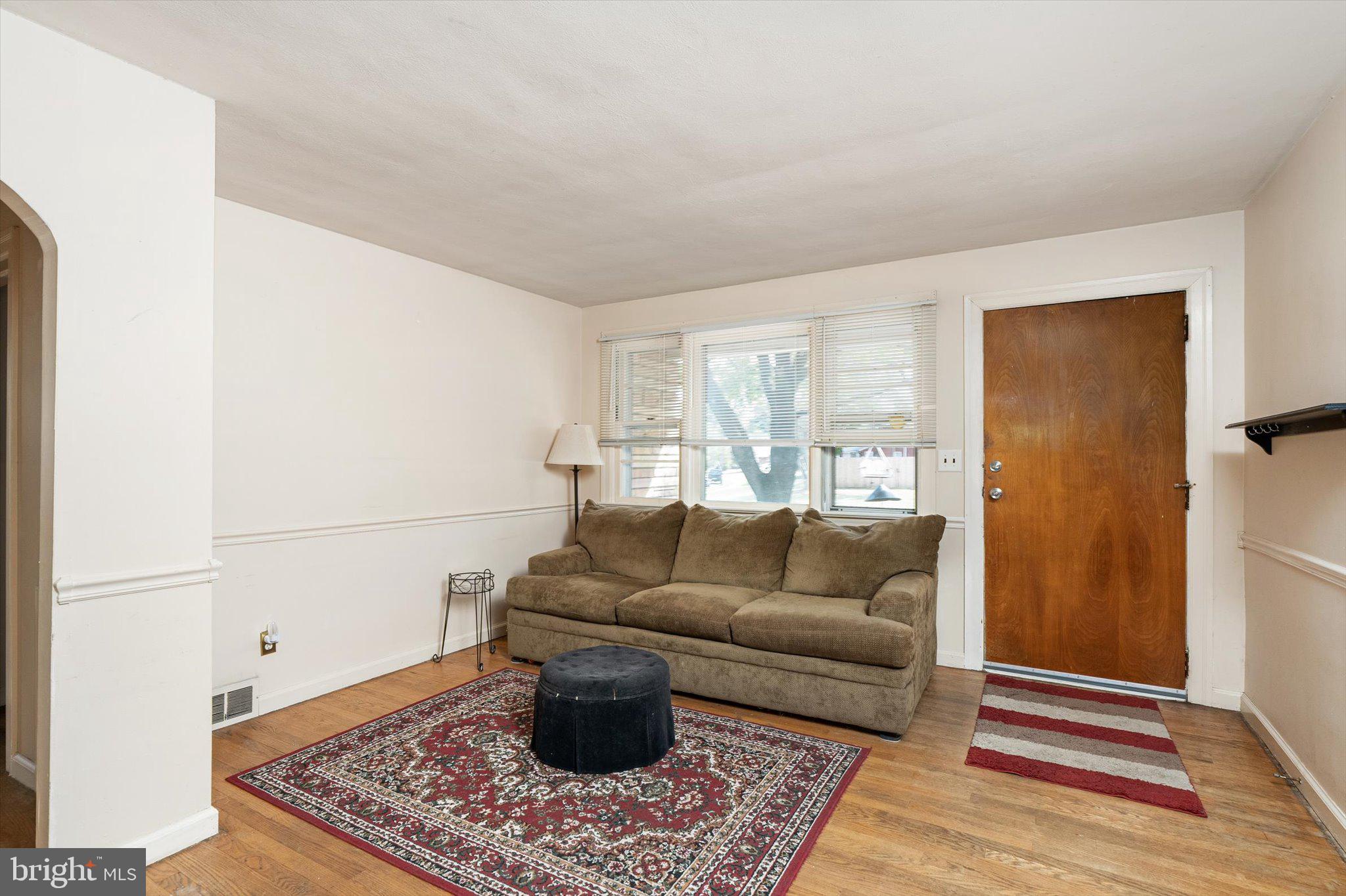 12 Fox Lane Hamilton, NJ 08620 - Photo 10 of 26 a living room with a couch and a coffee table