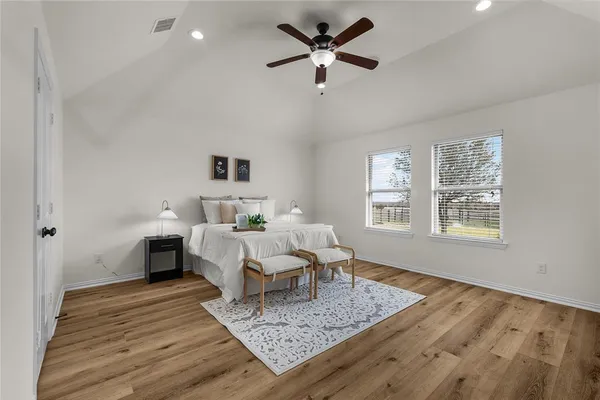 a bed room with a bed and a window