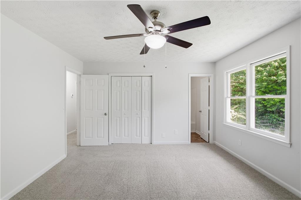 79 Cross Creek Court Villa Rica, GA 30180 - Photo 11 of 27 a view of an empty room with a window