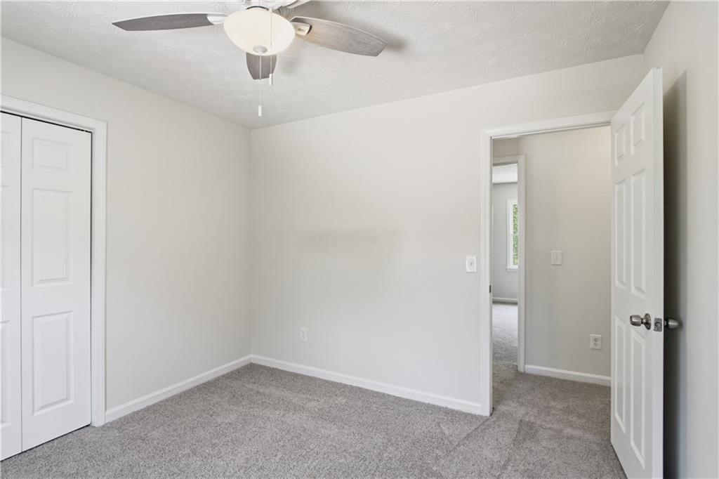 79 Cross Creek Court Villa Rica, GA 30180 - Photo 14 of 27 wooden floor in an empty room