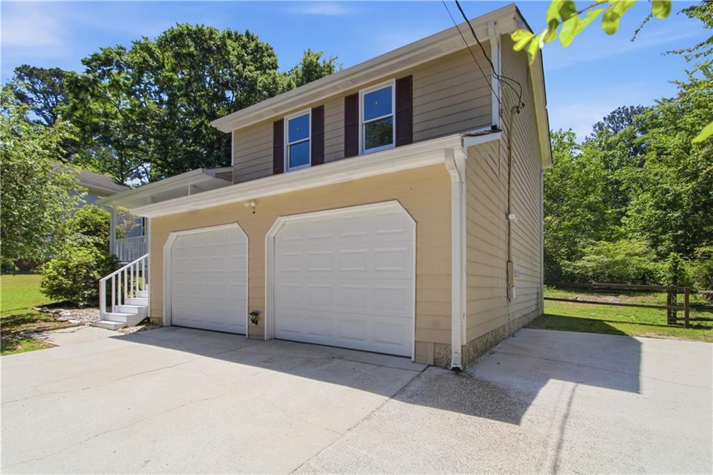 79 Cross Creek Court Villa Rica, GA 30180 - Photo 2 of 27 a view of a house with a yard