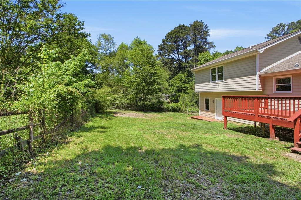 79 Cross Creek Court Villa Rica, GA 30180 - Photo 24 of 27 a view of a house with a backyard