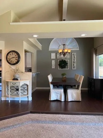 a view of a livingroom with furniture and window