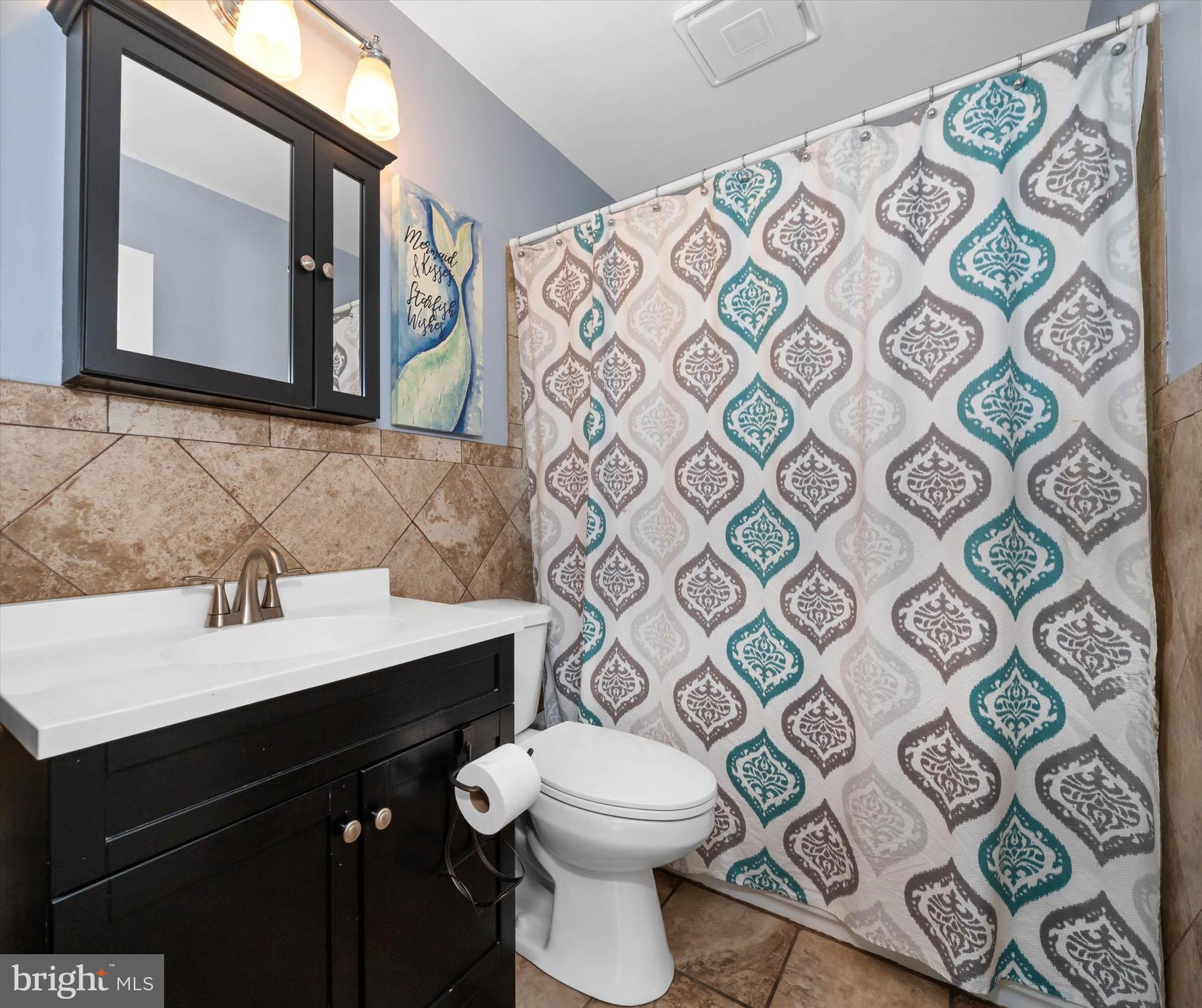 4 Flora Circle Newark, DE 19711 - Photo 27 of 41 a bathroom with a sink toilet and mirror