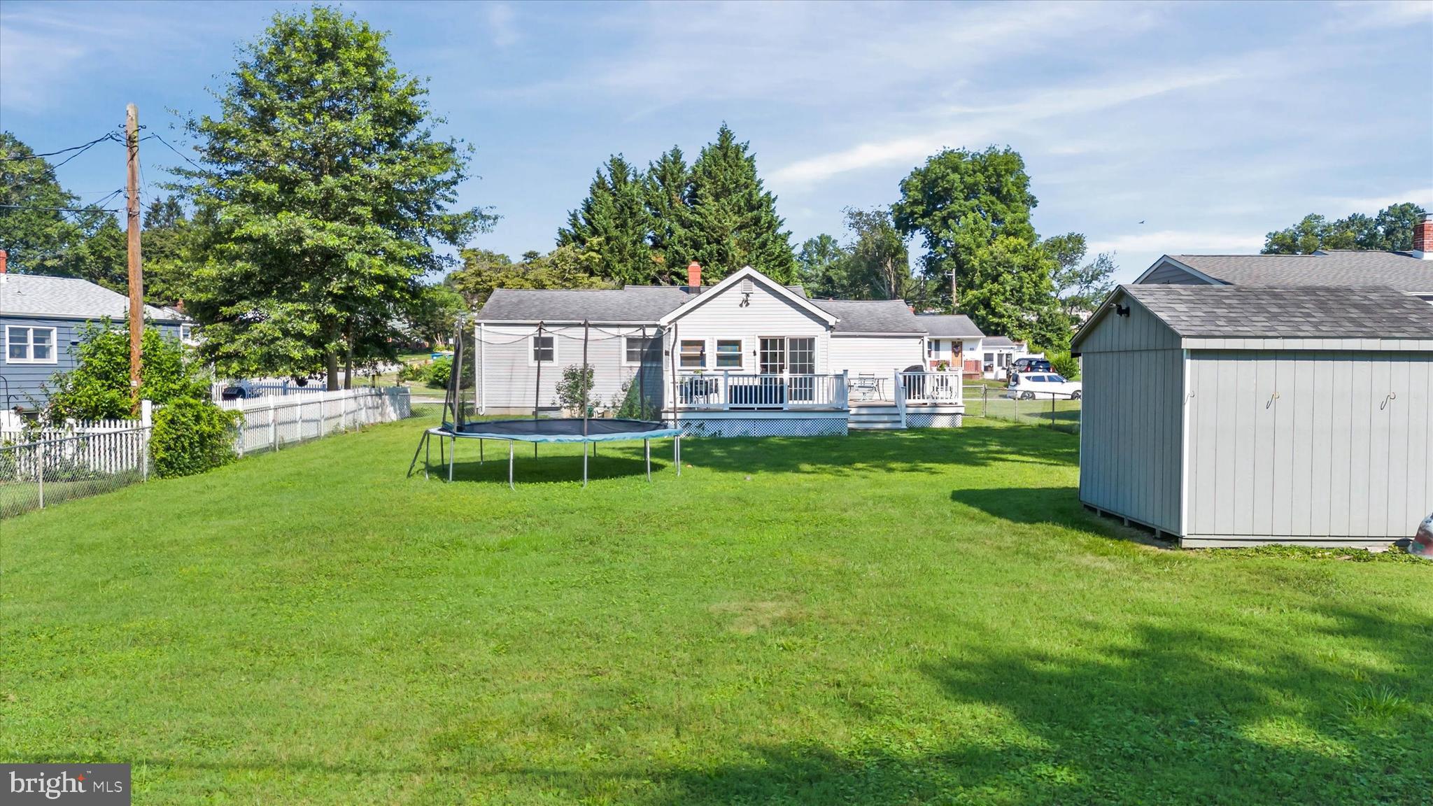 4 Flora Circle Newark, DE 19711 - Photo 32 of 41 a view of a house with a backyard and a porch